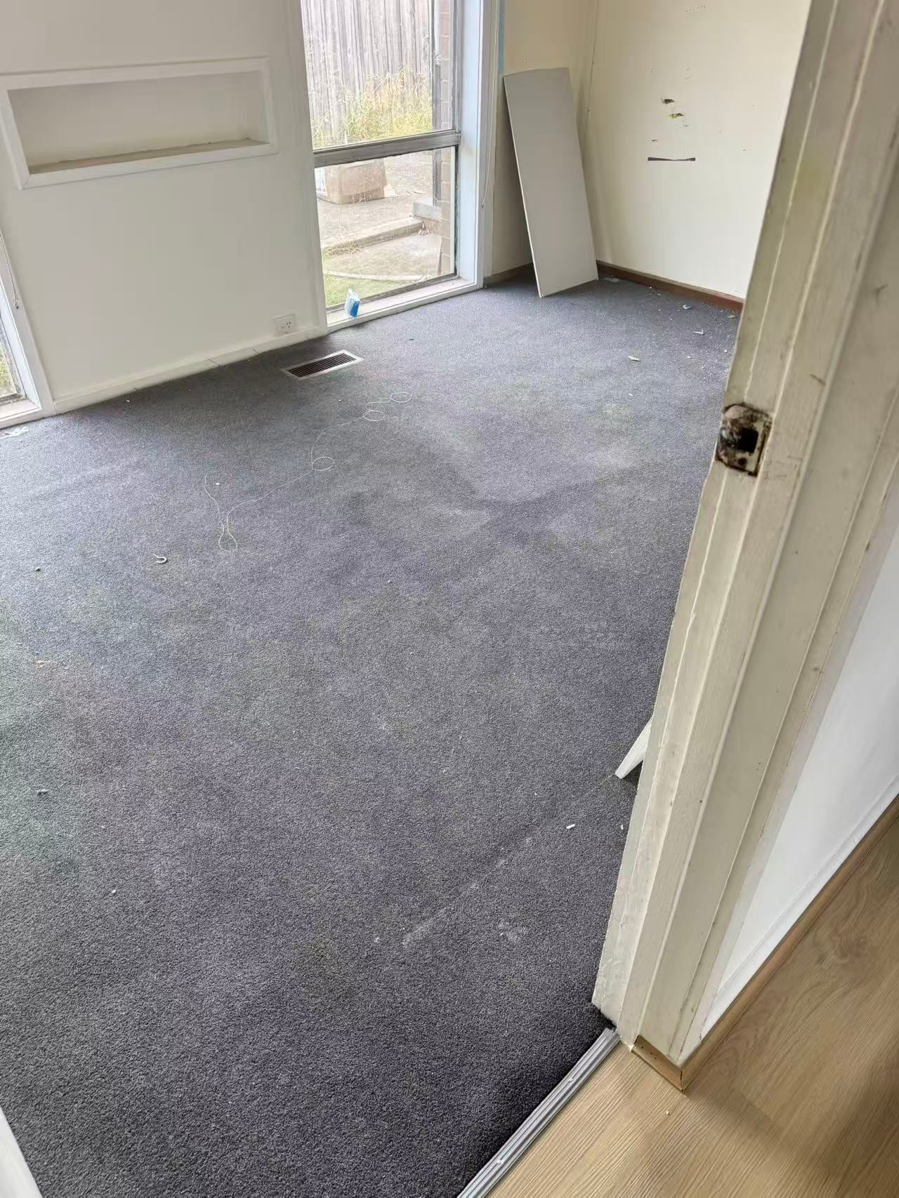 Interior room condition with wall and floor surfaces visible