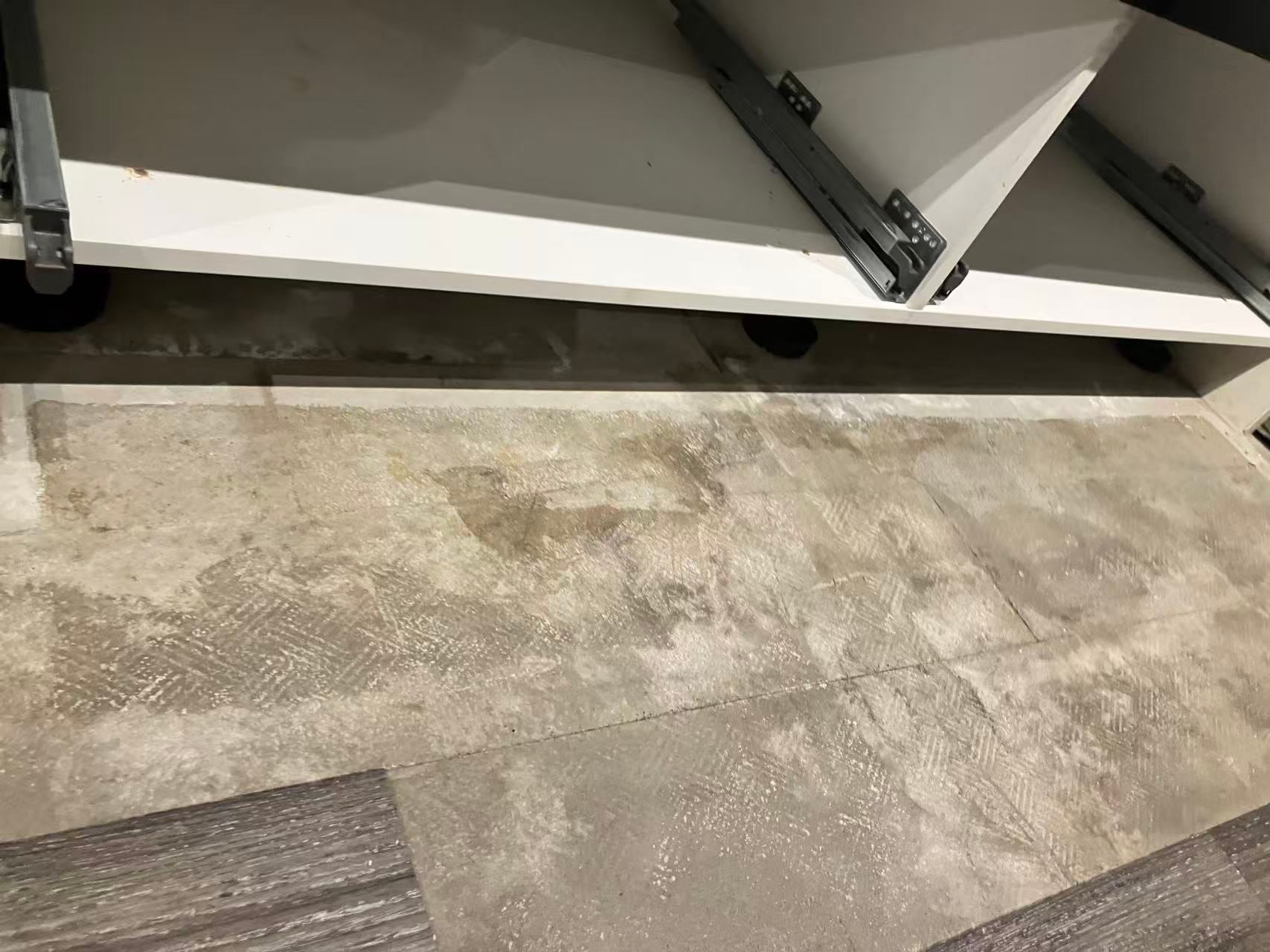 Cabinet and flooring junction detail