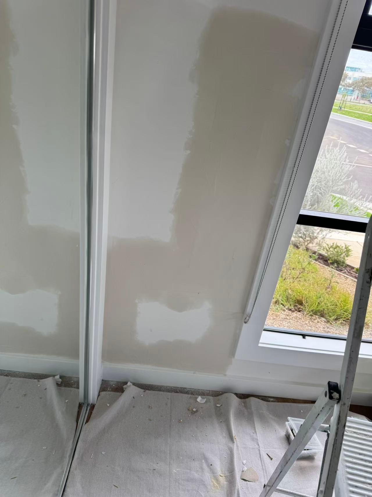 Wall preparation beside an interior window