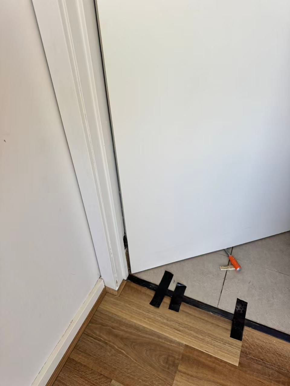 Floor transition preparation at an interior doorway