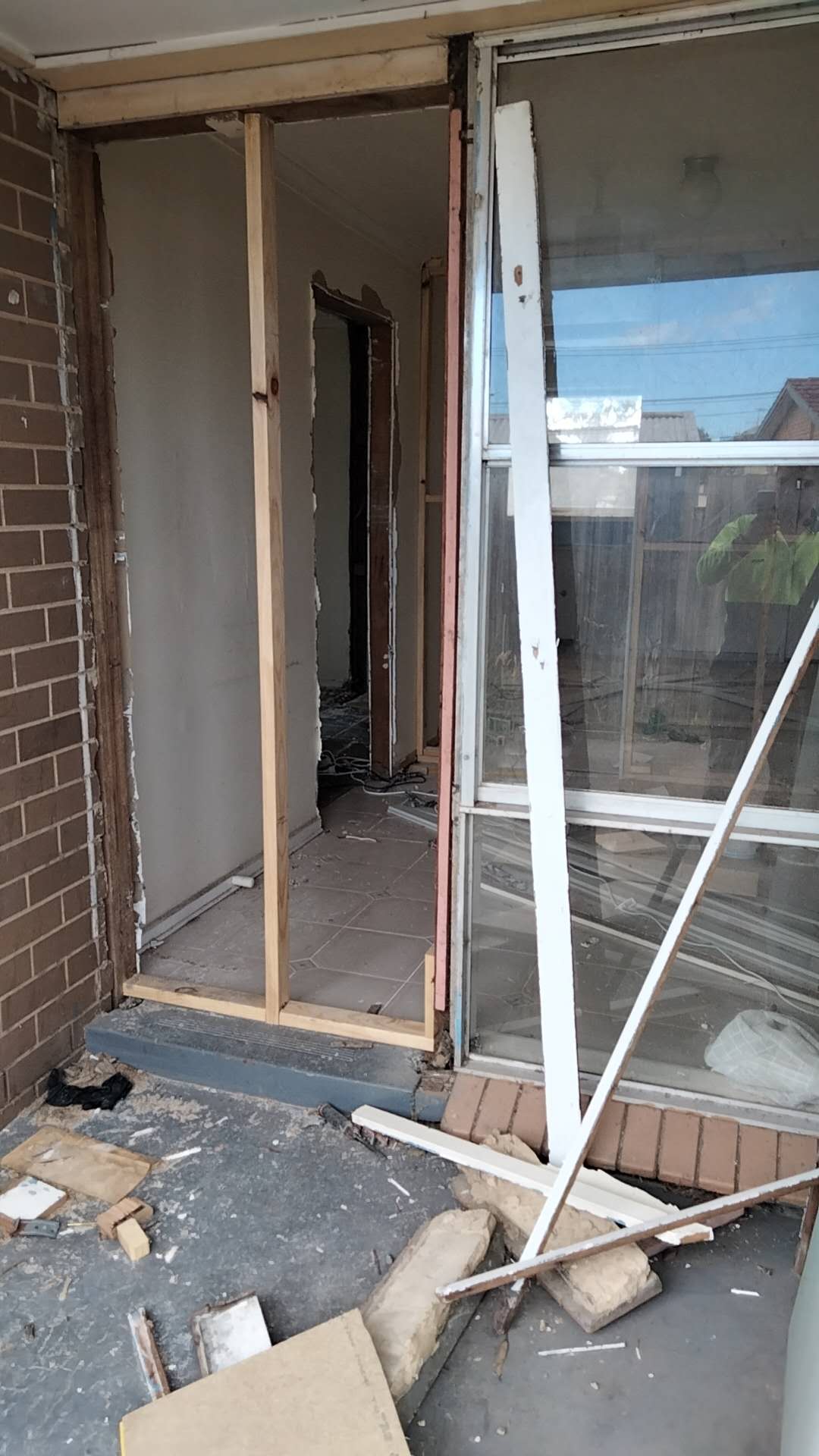 External door opening with exposed framing
