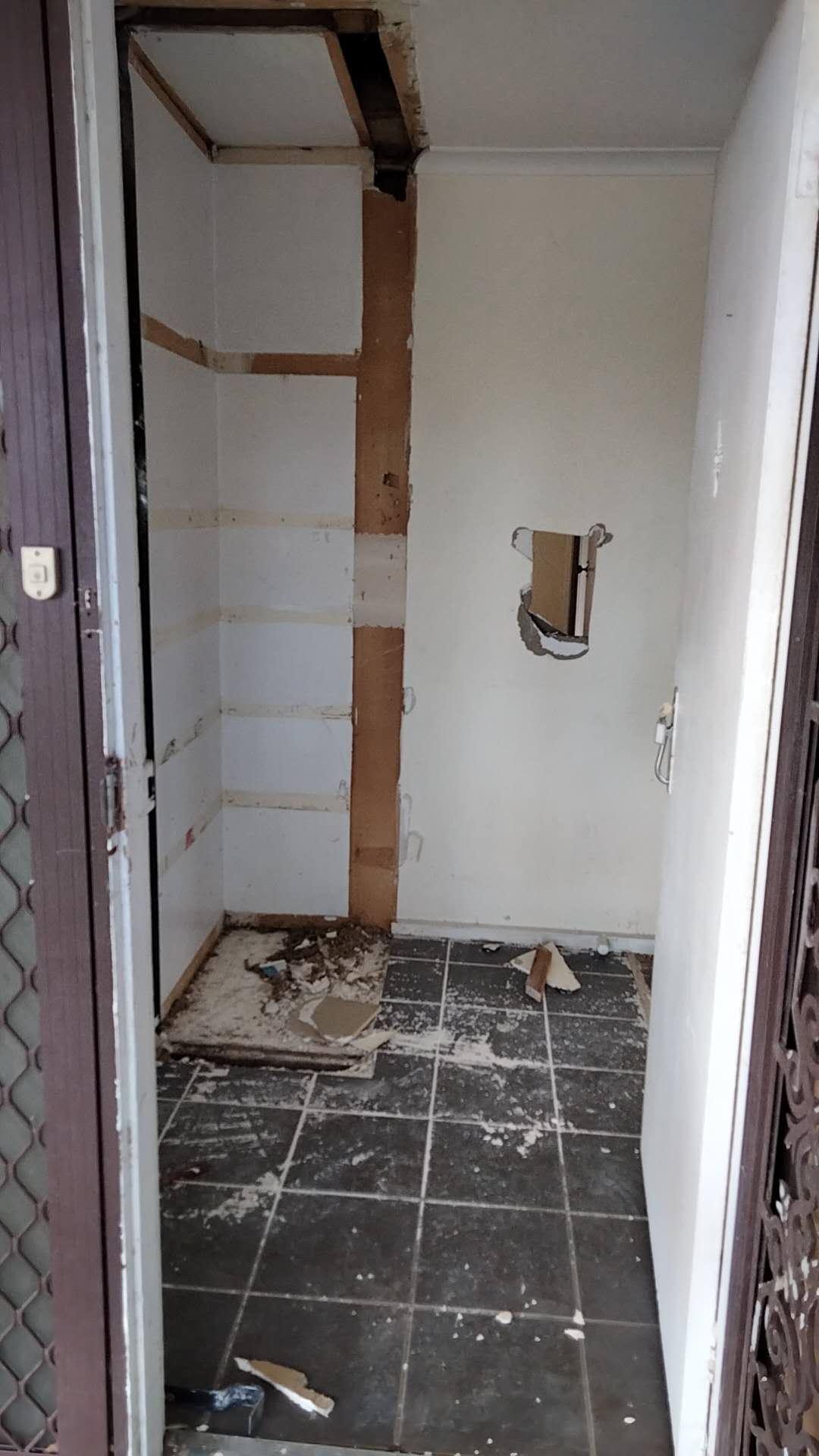 Wet-area wall and floor surfaces without final finishes